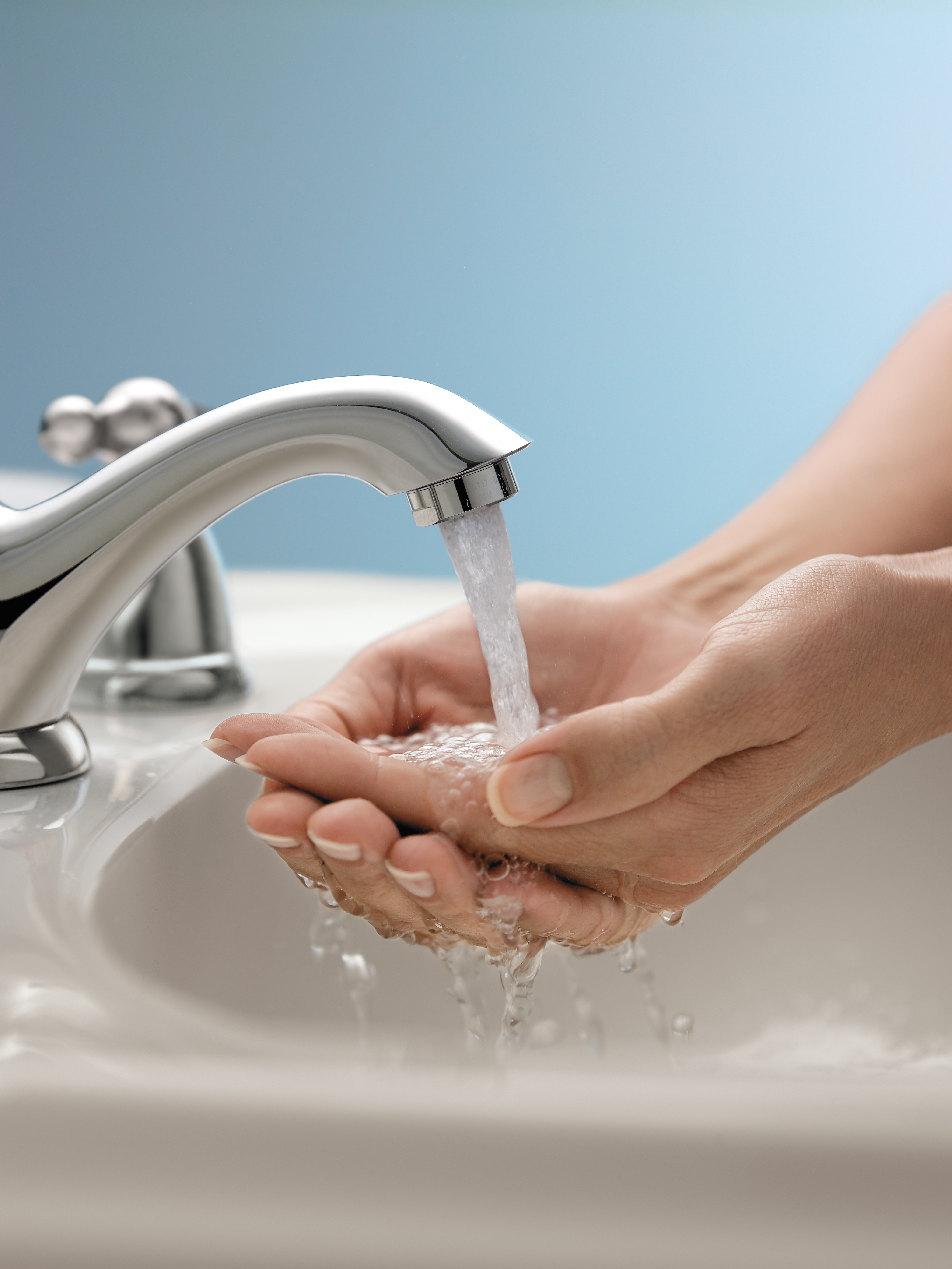 Hands Cupped Under Water
